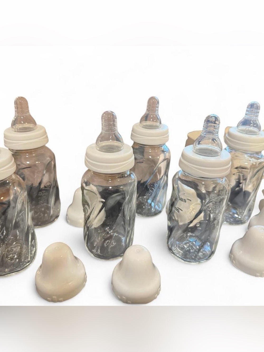 Set of Clear Glass Baby Bottles with White Nipples and Caps - 6 Pack